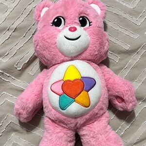 True Heart Pink Plush Stuffed Animal with Colorful Emblem
